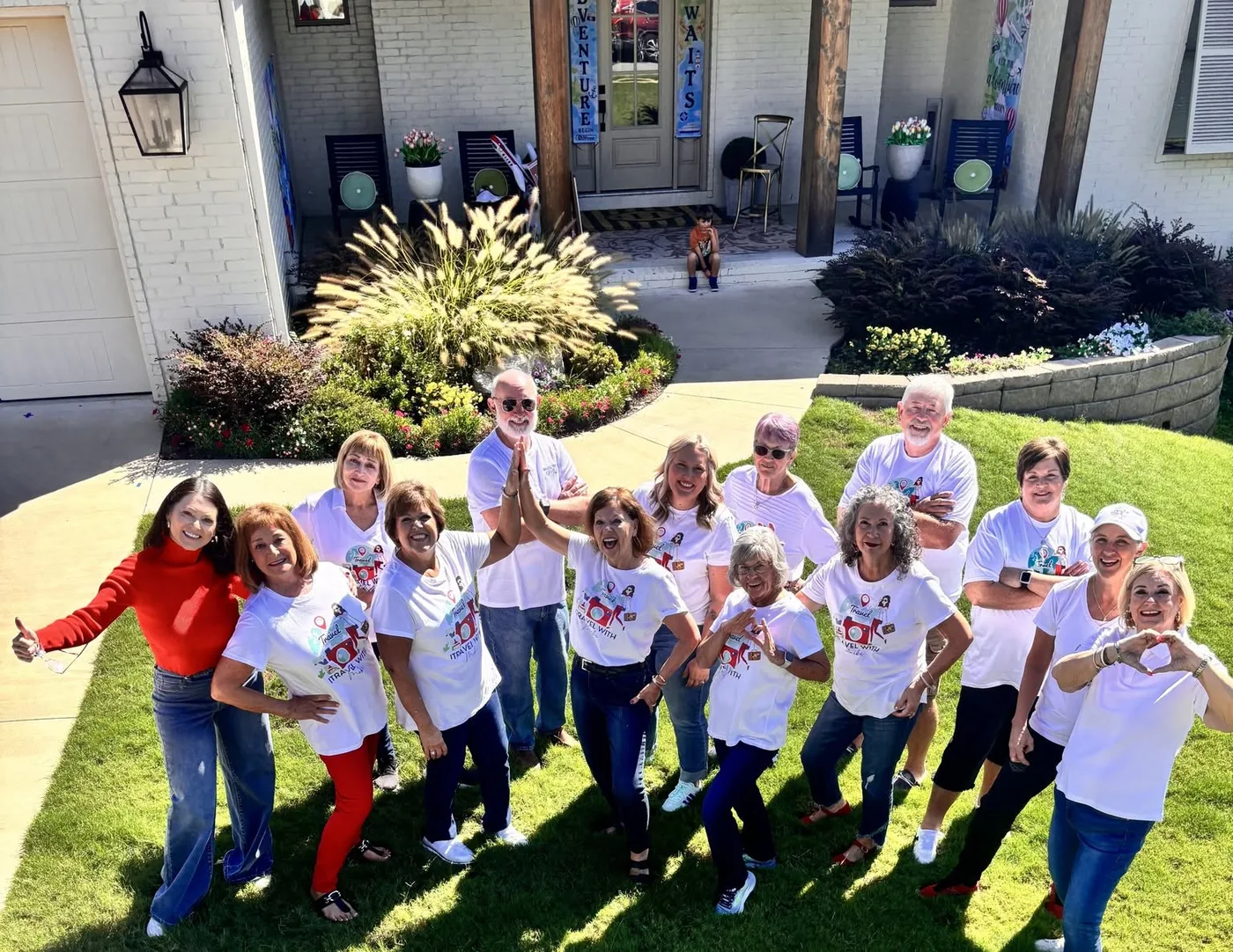 The I Travel With Miki trip leaders together in their team shirts